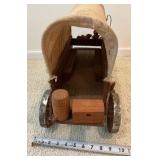 Vintage miniature wooden covered wagon with celluloid people toy display