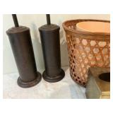 Group of bathroom essentials wicker waist basket toiler brush