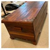 Cedar wood chest with brass corner hardware and ornate details