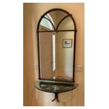 Ornate arched entryway mirror with matching wall console