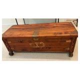 Cedar wood chest with brass corner hardware and ornate details