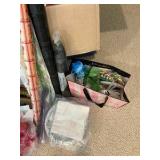 Various paper plates, plastic cups, party supplies