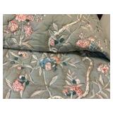Vintage French Provincial style twin bed, dark wood frame with a cushioned, light green floral upholstered headboard
