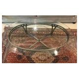 Wrought iron oval coffee table with beveled glass top