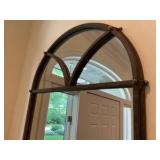 Ornate arched entryway mirror with matching wall console