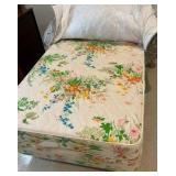 Vintage French Provincial style twin bed, dark wood frame with a cushioned, light green floral upholstered headboard