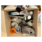 Various paper plates, plastic cups, party supplies