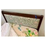 Vintage French Provincial style twin bed, dark wood frame with a cushioned, light green floral upholstered headboard