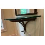 Ornate arched entryway mirror with matching wall console