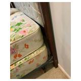 Vintage French Provincial style twin bed, dark wood frame with a cushioned, light green floral upholstered headboard