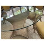 Outdoor Ratan patio set with glass tabletop, chairs