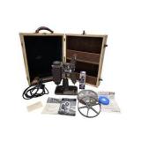 Estimated value $200-$300! Vintage Revere Eight 8mm Projector Model 85 With Case, Reels, Manuals & GE Projection Lamp