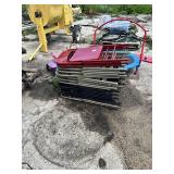 Stack of Metal Folding Chairs