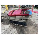 Stack of Metal Folding Chairs