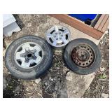 Lot of 3 Wheels and Tires Including Bridgestone Dueler H/P 235/65R on 5-Lug Alloy Wheel, Laufenn G Fit 195/60R15 on Steel Rim, and Dodge Rim