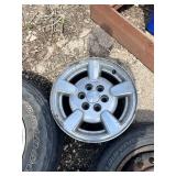 Lot of 3 Wheels and Tires Including Bridgestone Dueler H/P 235/65R on 5-Lug Alloy Wheel, Laufenn G Fit 195/60R15 on Steel Rim, and Dodge Rim