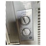 GE Window Air Conditioner Unit approximately 16 inches wide by 13 inches tall with manual rotary Temp and Mode controls - Works