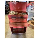 Metal Tool Chest with Tools including screwdrivers, hammers, saws, measuring tapes, and brushes