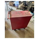 Craftsman Red Tool Chest with Tools such as screwdrivers, levels, and clamps