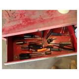 Craftsman Red Tool Chest with Tools such as screwdrivers, levels, and clamps