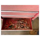 Craftsman Red Tool Chest with Tools such as screwdrivers, levels, and clamps