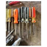 Various brand screwdrivers, bits, and hand tools