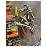 Various brand screwdrivers, bits, and hand tools