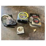 Multiple tape measures from brands including Stanley and Tool Shed, sizes range from 10