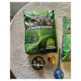 Menards Lawn Food and Garden Accessories including Lawn Sprinkler, Hose Fittings, and Glass Watering Globe