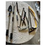 Garden hand tools including trowel, garden fork, hedge shears, pruning shears, and bow saws Set