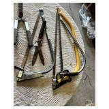 Garden hand tools including trowel, garden fork, hedge shears, pruning shears, and bow saws Set