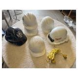 Hard hats including Milwaukee Model, White Hard Hats, Black Hard Hat with Skull Design, and Extension Cord
