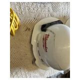 Hard hats including Milwaukee Model, White Hard Hats, Black Hard Hat with Skull Design, and Extension Cord