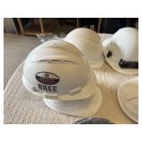 Hard hats including Milwaukee Model, White Hard Hats, Black Hard Hat with Skull Design, and Extension Cord