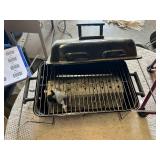 Red Folding Camp Chair, Master Cook Portable Grill, and Hiking Poles