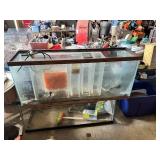 Large Fish Tank and Accessories including Air Pump, Decorative Rocks, and Miscellaneous Supplies