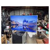 TCL Model 65S41 65" 4K UHD Roku TV with Remote Control