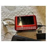 Lot of Electronics and Accessories including RCA Portable DVD Player Monitors, Garmin GPS, and Red Media Player with Cables