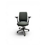 Steelcase Amia office chair featuring adjustable arms and a Black fabric seat