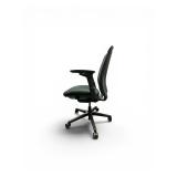 Steelcase Amia office chair featuring adjustable arms and a Black fabric seat