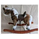 Vintage Sound N Light plush rocking horse features a brown and white pinto design with a wooden base, works