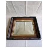 Antique Victorian Eastlake shadow box frame mirror,dark walnut wood exterior and an ornate gold gilt trim