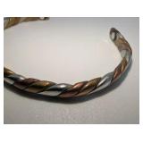 Sergio Lub twisted cuff bracelet features a tri-color design- copper, brass, and German silver | Size 7