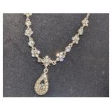 Bridal jewelry set,floral-inspired motifs and sparkling CZ teardrop pendants