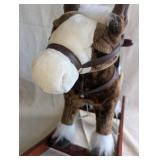 Vintage Sound N Light plush rocking horse features a brown and white pinto design with a wooden base, works