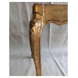 Italian Florentine side table from the 1950s,distinctive weathered gold gilt finish over a red base