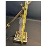 House of Troy polished brass desk lamp, adjustable swing arm and a fluted crystal column