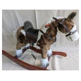 Vintage Sound N Light plush rocking horse features a brown and white pinto design with a wooden base, works