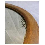 Antique Victorian wall mirror, beautifully carved oak frame and a distinct oval design