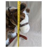 Vintage Sound N Light plush rocking horse features a brown and white pinto design with a wooden base, works
